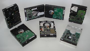 Old computer hard drives before shredding