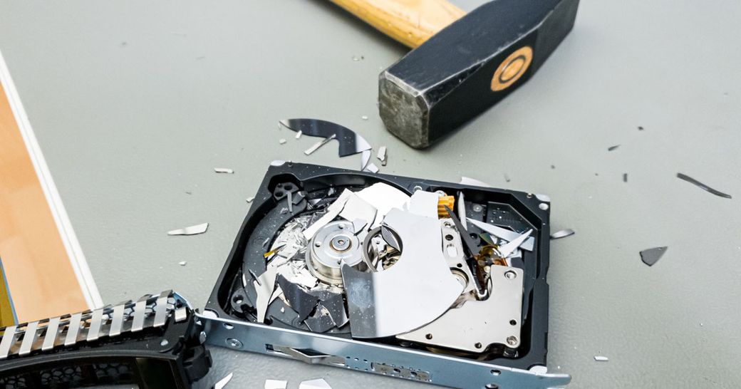 Destroying Computer Hard Drive with a Hammer